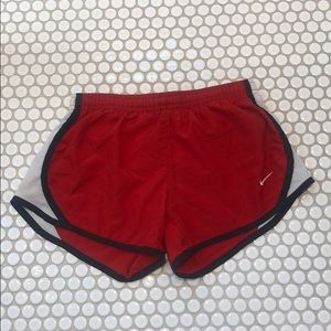 NIKE red athletic shorts